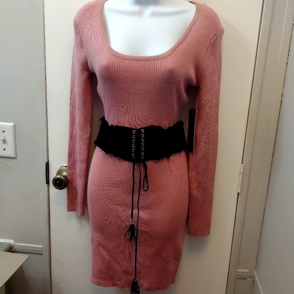 Dress size medium with a black belt
